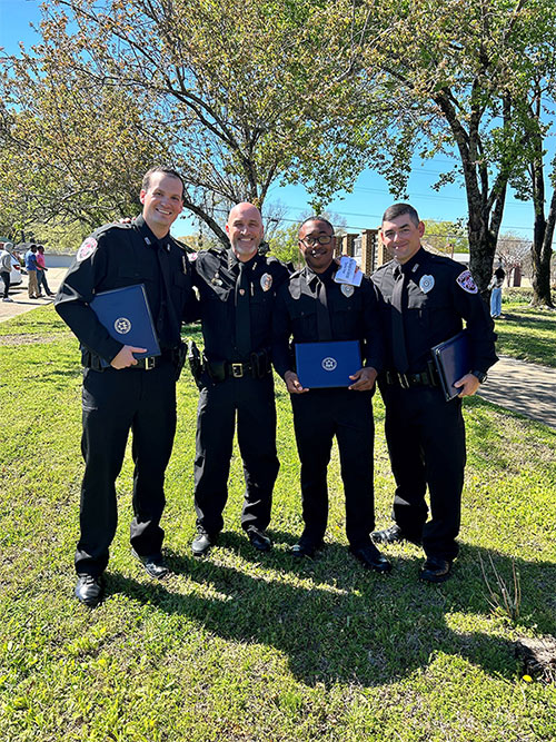 APP Assistant Police Chief Brian Locke, second from left, recently congratulated MSUPD officers Tyler Hawkins, left, Deveair Salter, and William Bowling on their graduation from the North Mississippi Law Enforcement Training Academy